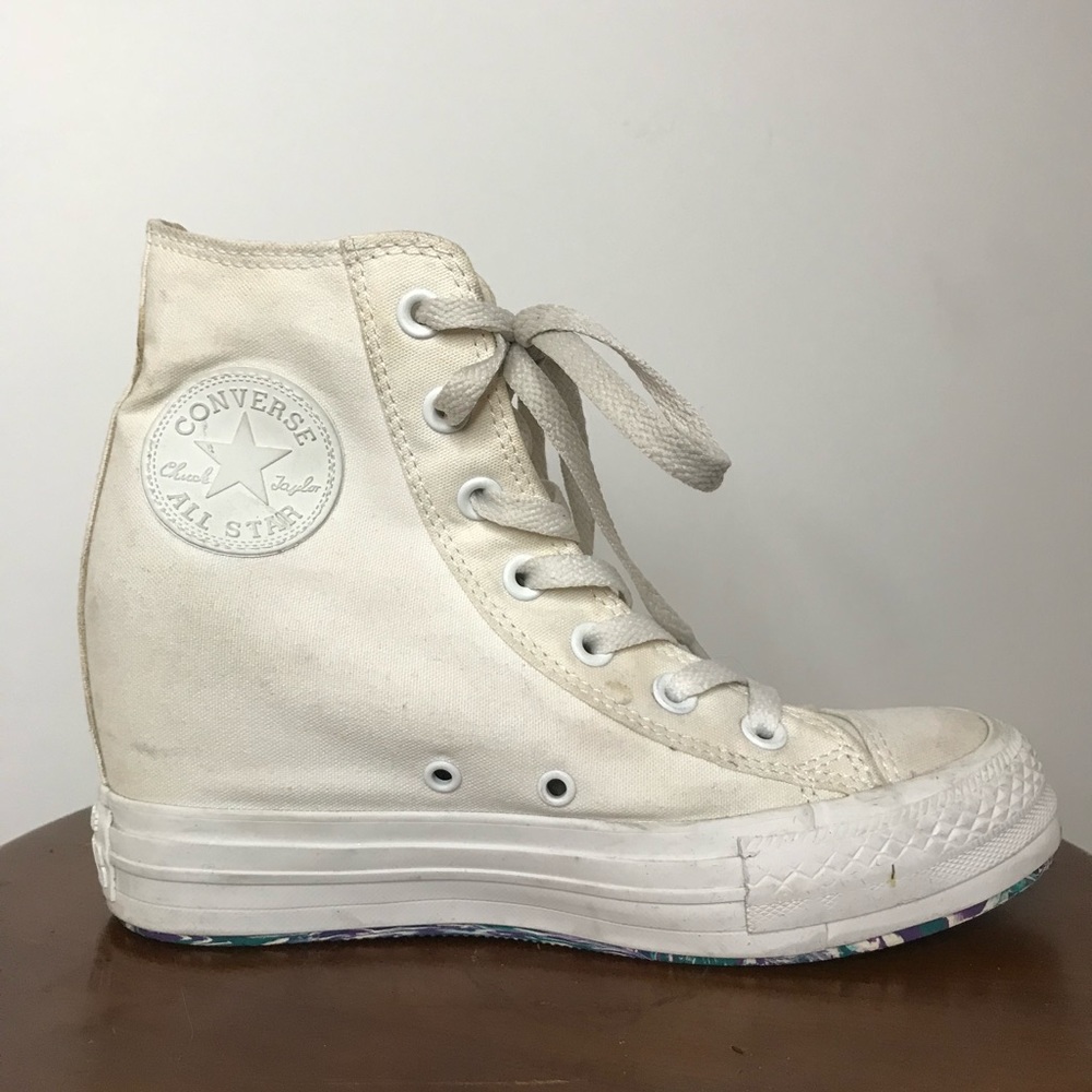 Converse heeled white shoe